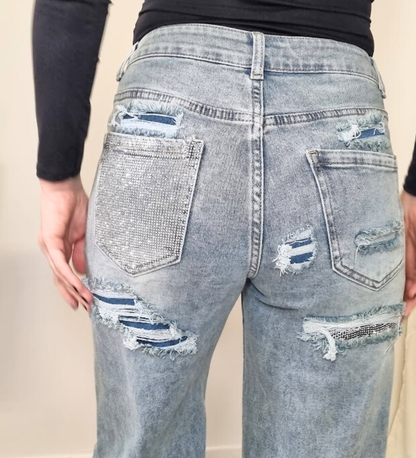 JEANS A PALAZZO CON TASCA GLITTERATA ARGENTO E TOPPE BLU