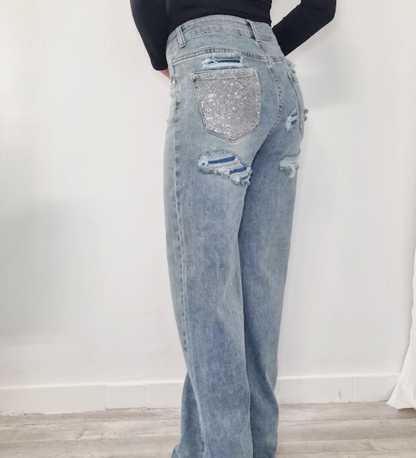 JEANS A PALAZZO CON TASCA GLITTERATA ARGENTO E TOPPE BLU