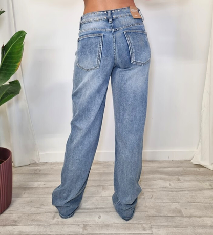 Jeans palazzo wide leg con borchie